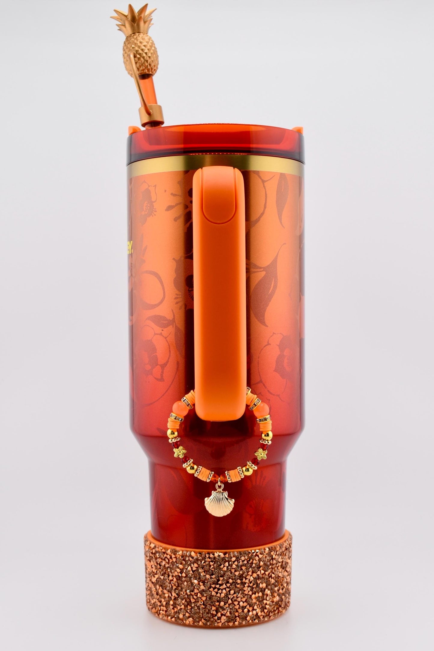 Orange Red and Gold Tumbler Handle Charm Bracelet with Shell Charm