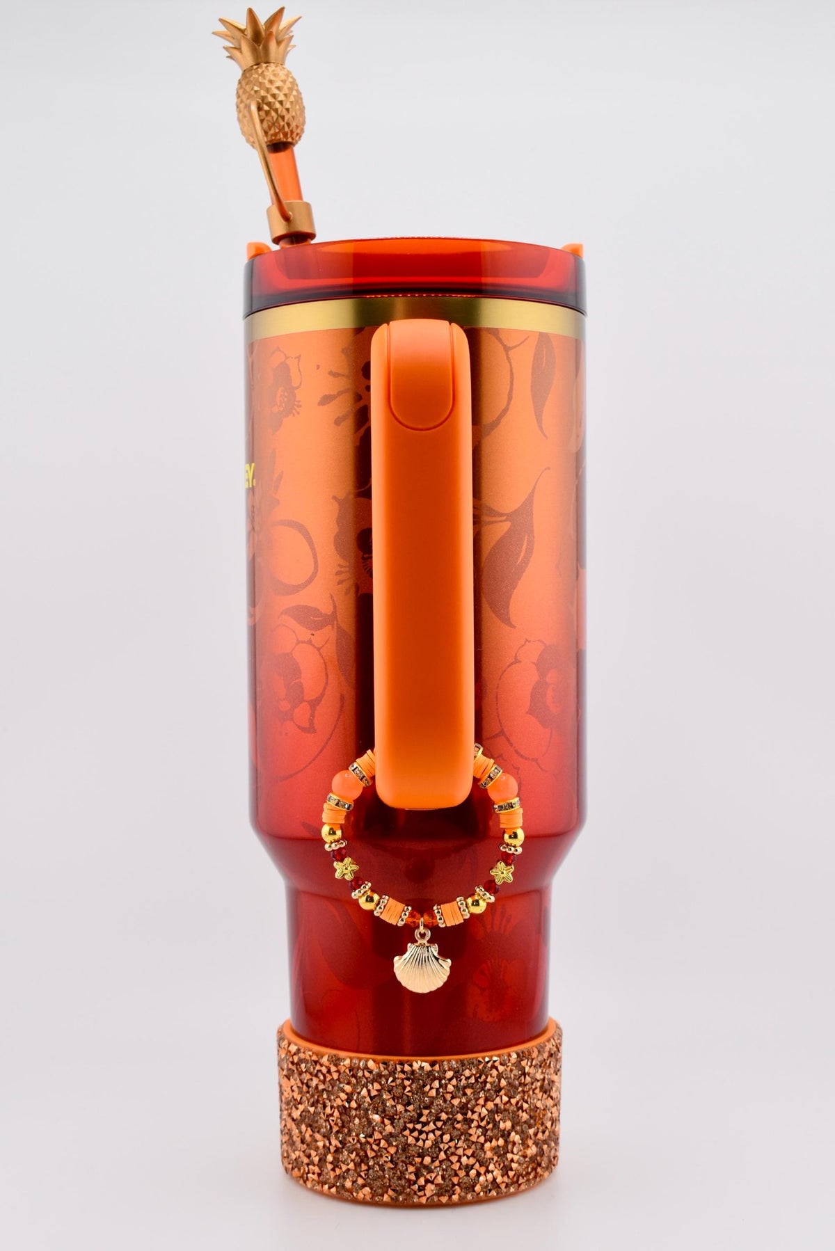 Orange Red and Gold Tumbler Handle Charm Bracelet with Shell Charm