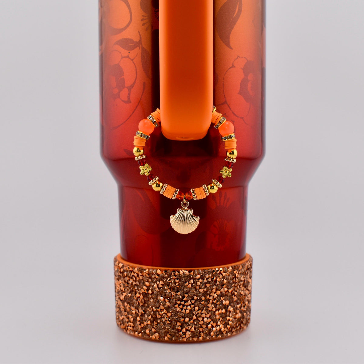 Orange Red and Gold Tumbler Handle Charm Bracelet with Shell Charm
