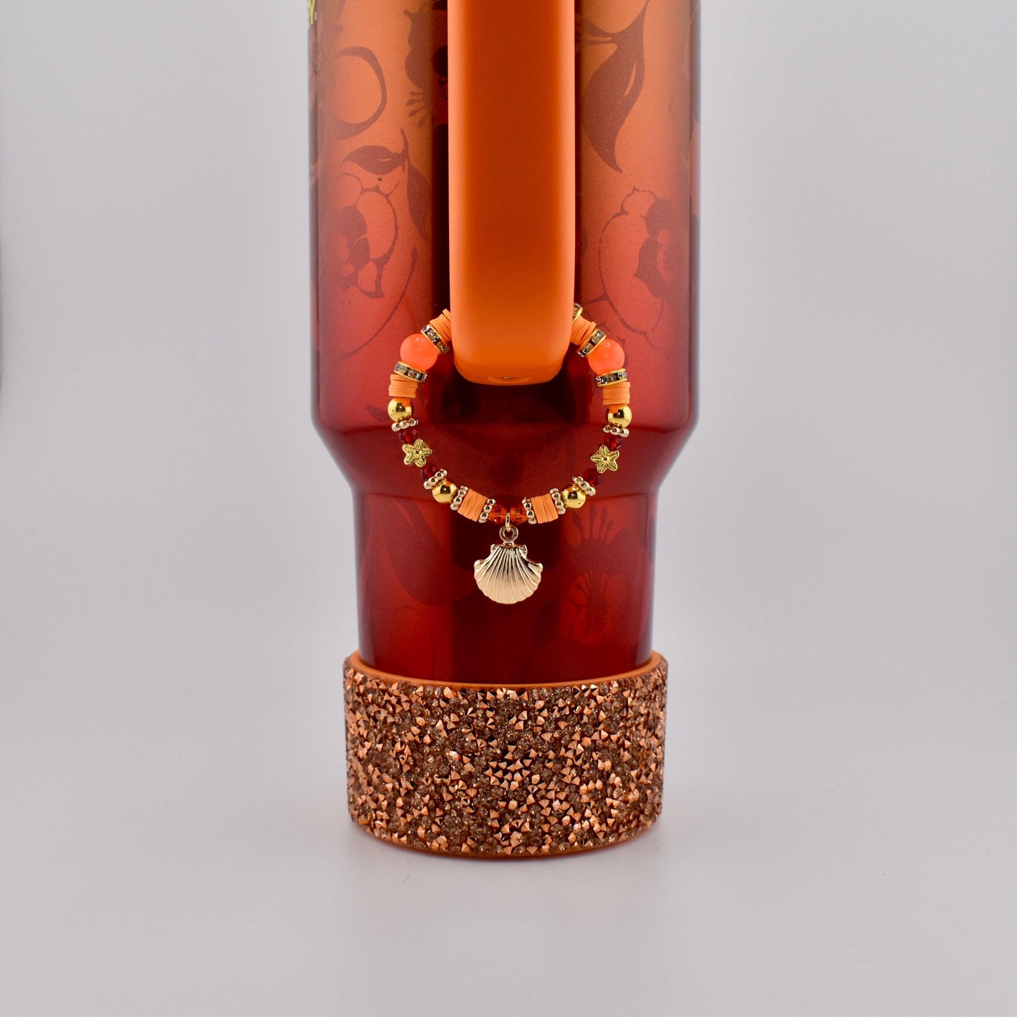 Orange Red and Gold Tumbler Handle Charm Bracelet with Shell Charm