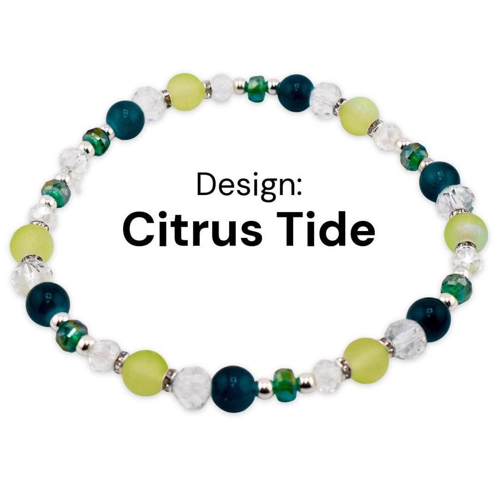 A beaded bracelet with the text "Design: Citrus Tide". The bracelet features a mix of green, yellow, clear, and dark teal beads. The beads are strung together with silver-colored spacers, creating a colorful and stylish accessory.