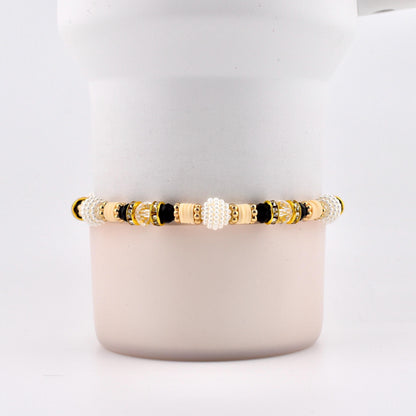 Wild Blooms Bracelet Collection: Black, Cream and Gold Beaded Bracelets