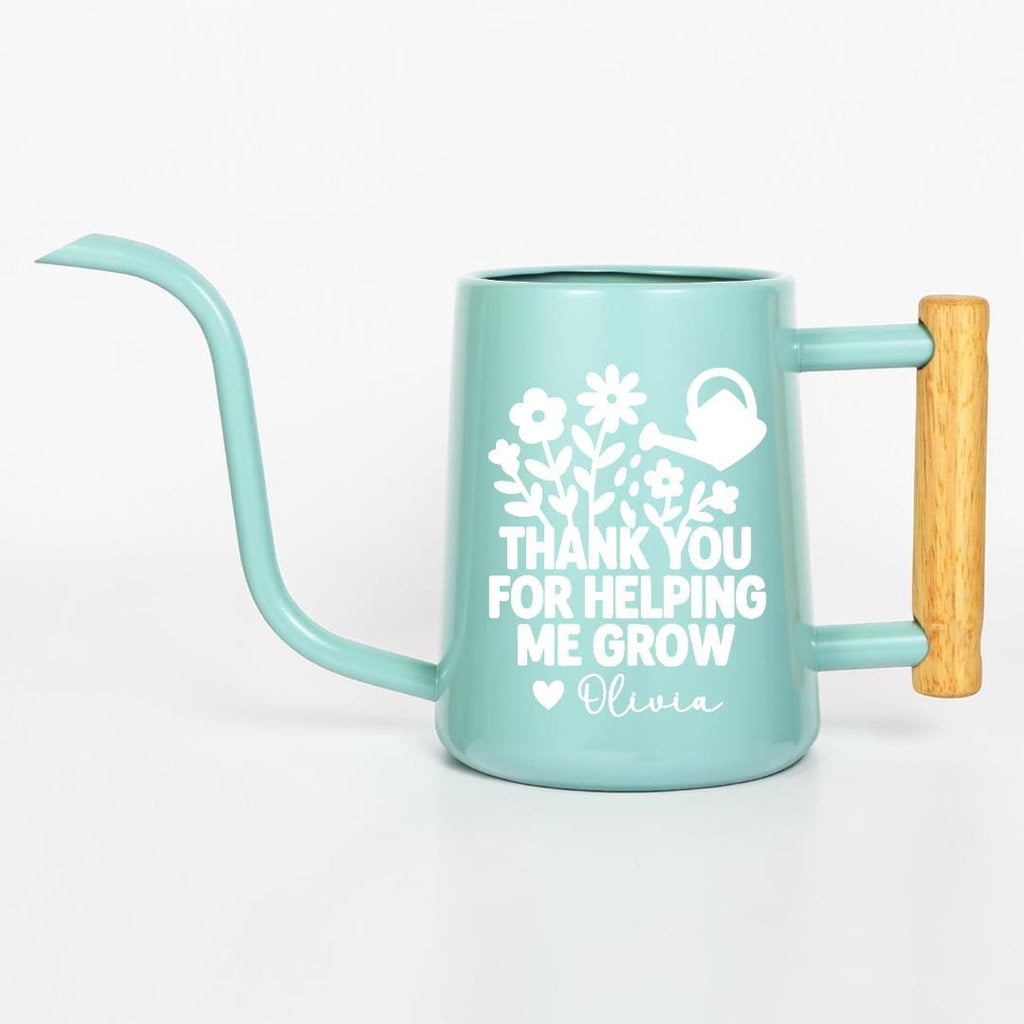 Personalized mint green watering can with wooden handle, customized with 'Thank You for Helping Me Grow' and name Olivia in white floral design — teacher appreciation gift, plant lover gift, custom gardening gift