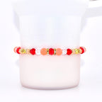 Orange Red and Gold Bracelet Collection with Hibiscus Flowers and Shell Charms