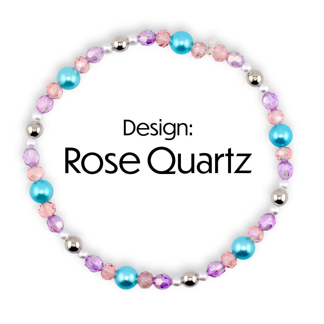 A beaded bracelet with the text "Design: Rose Quartz". The bracelet features a variety of beads in shades of pink, purple, and turquoise, interspersed with silver-colored beads. The beads are arranged in a circular pattern.