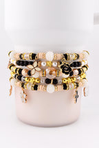 Wild Blooms Flower Charm Bracelet Collection: Black, Cream and Gold Beaded Bracelets
