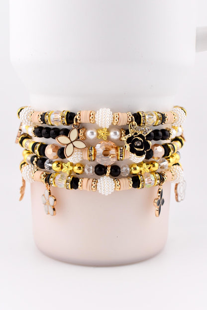 Wild Blooms Flower Charm Bracelet Collection: Black, Cream and Gold Beaded Bracelets