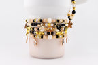 Wild Blooms Flower Charm Bracelet Collection: Black, Cream and Gold Beaded Bracelets