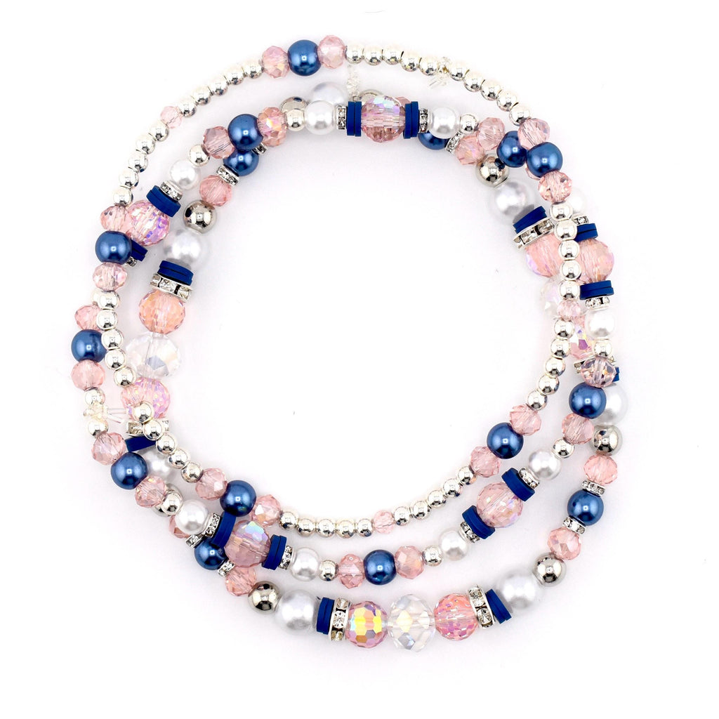 A set of 5 beaded bracelets with navy blue, light pink and silver beads.