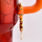 Orange Red and Gold Tumbler Handle Charm Bracelet with Shell Charm