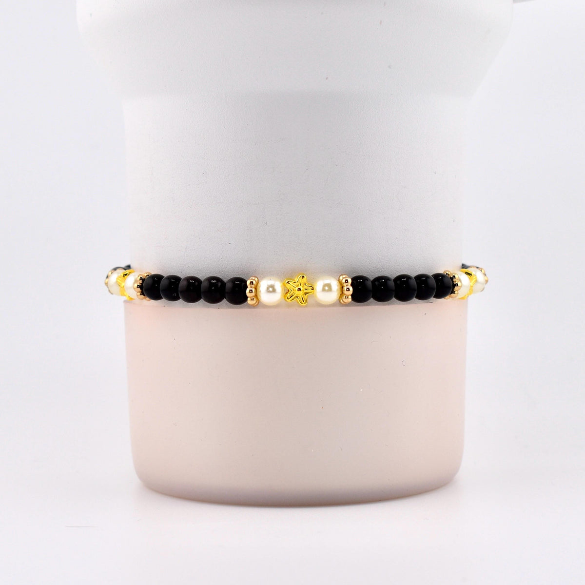 Wild Blooms Bracelet Collection: Black, Cream and Gold Beaded Bracelets