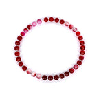 Red agate gemstone stretch bracelet – natural crystal bead jewelry for energy healing and grounding.