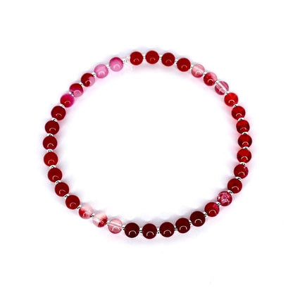 Red agate gemstone stretch bracelet – natural crystal bead jewelry for energy healing and grounding.