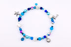 Blue ocean beaded charm bracelet with silver seashell charms, starfish charm and mermaid tail charm, mixed blue navy and turquoise pearl crystal and glass beads – handmade coastal beach bracelet nautical jewelry