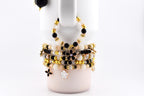 Wild Blooms Flower Charm Bracelet Collection: Black, Cream and Gold Beaded Bracelets