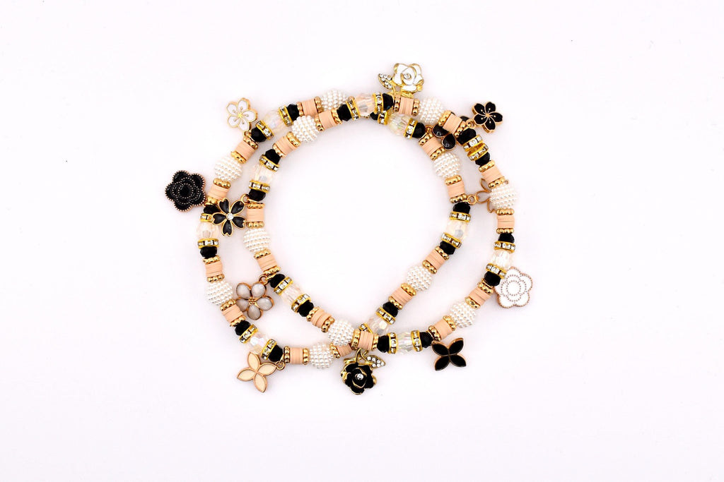 Wild Blooms Flower Charm Bracelet Collection: Black, Cream and Gold Beaded Bracelets