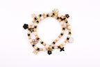 Wild Blooms Flower Charm Bracelet Collection: Black, Cream and Gold Beaded Bracelets