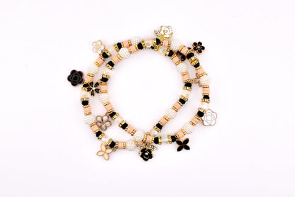 Wild Blooms Flower Charm Bracelet Collection: Black, Cream and Gold Beaded Bracelets