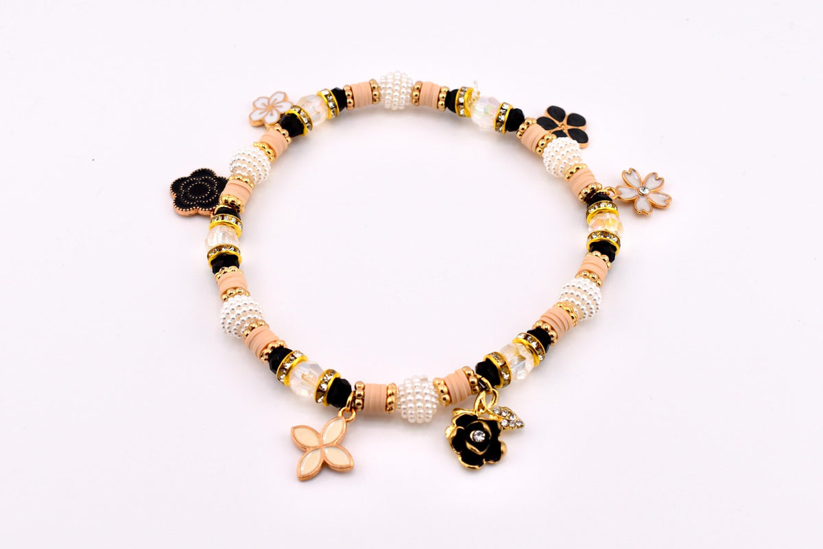 Wild Blooms Flower Charm Bracelet Collection: Black, Cream and Gold Beaded Bracelets