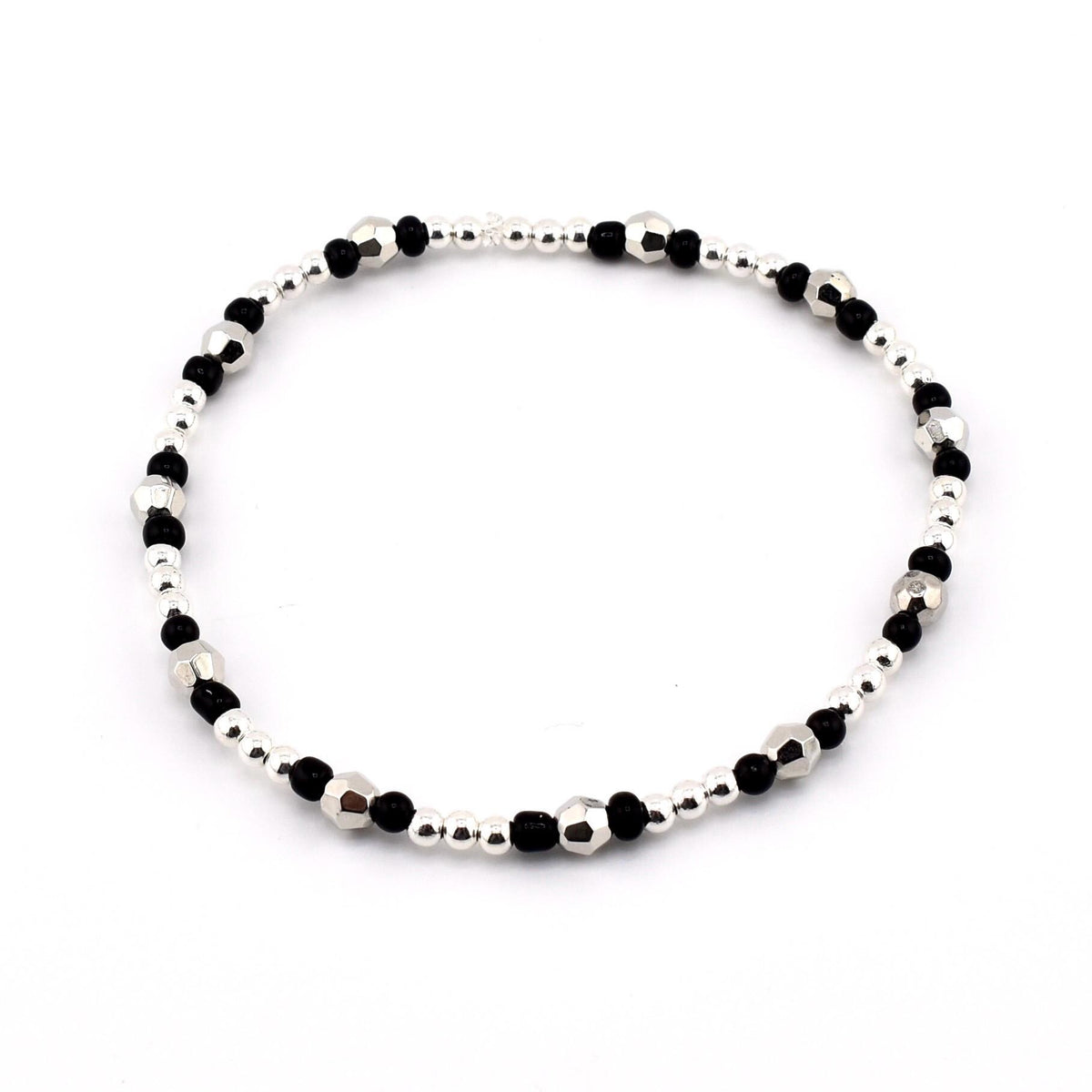 Hypnotic Green Bracelet Collection: Pastel Purple Green and Black Beaded Bracelets