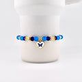 Blue and Gold Butterfly Heart Charm Bracelet