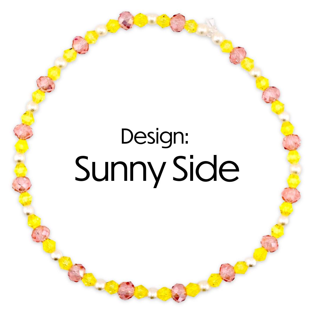 A circular beaded bracelet with yellow pink and white beads. The necklace features a design of yellow and pink faceted beads interspersed with white pearls. The text "Design: Sunny Side" is displayed in the center.