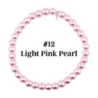 A light pink pearl bracelet. The bracelet is made of round, light pink pearls strung together. The text "#12 Light Pink Pearl" is displayed in the center of the bracelet.