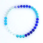 Blue gemstone bracelet – simple stretch beaded accessory with crystal accents for versatile wear.