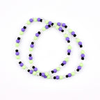 Hypnotic Green Bracelet Collection: Pastel Purple Green and Black Beaded Bracelets