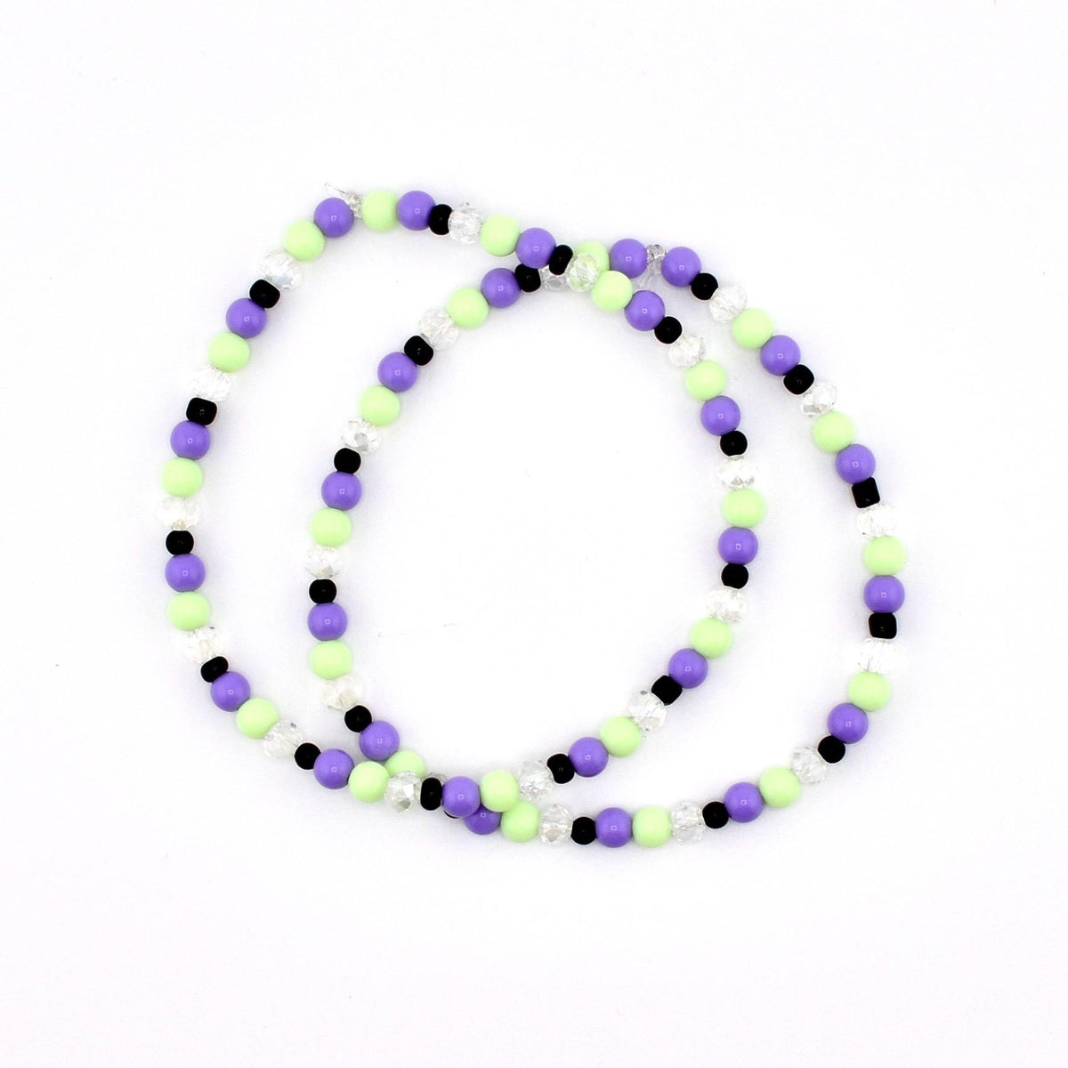 Hypnotic Green Bracelet Collection: Pastel Purple Green and Black Beaded Bracelets