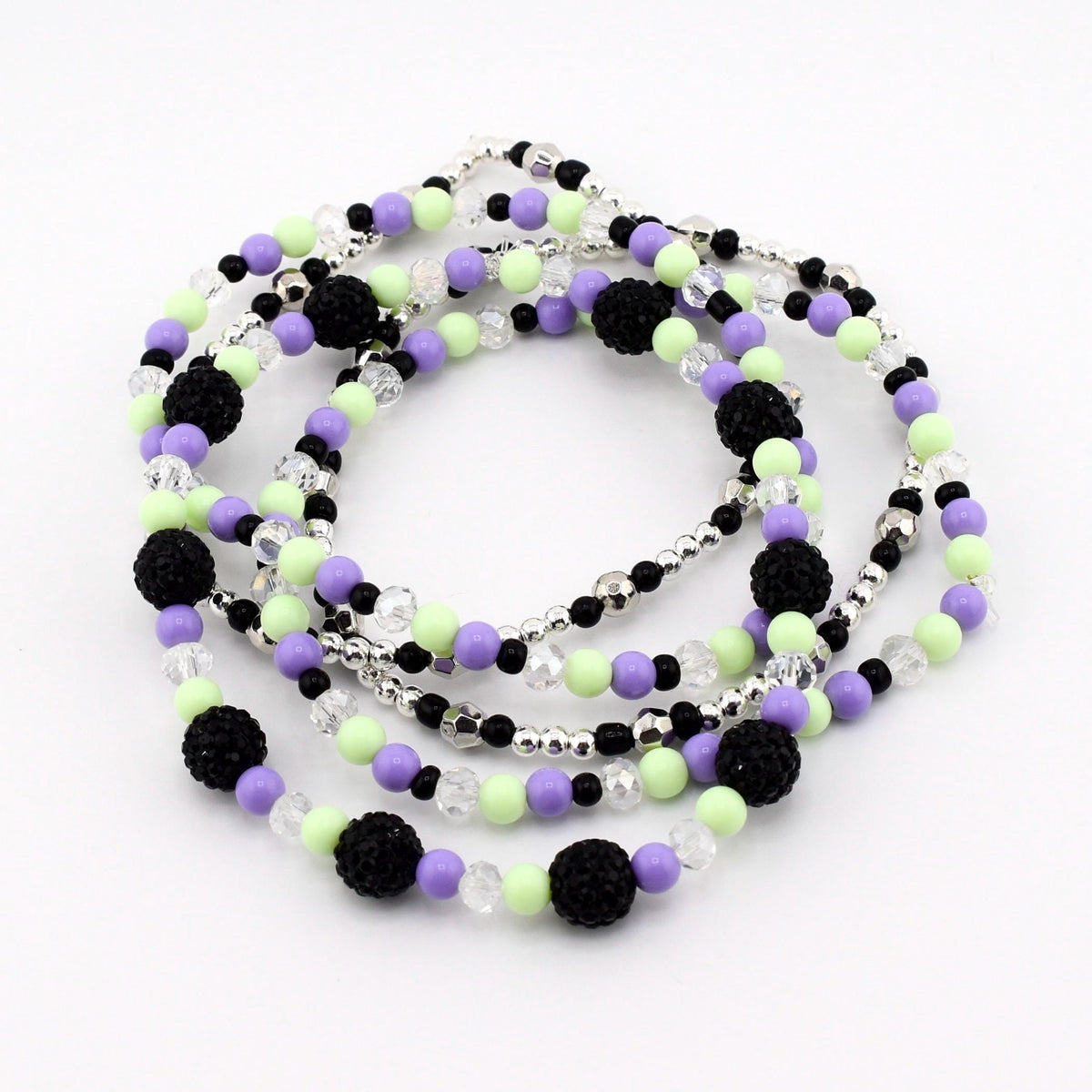 Hypnotic Green Bracelet Collection: Pastel Purple Green and Black Beaded Bracelets