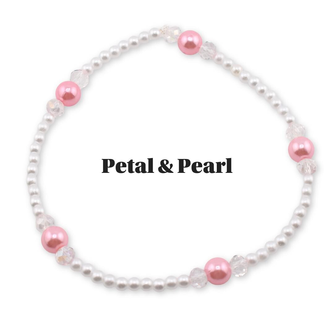 A delicate bracelet featuring small white pearls interspersed with clear crystal beads and larger, round, pink beads. The text "Petal & Pearl" is displayed in black, bold font.