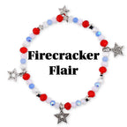 A beaded bracelet with red, white, and blue beads and silver star charms. The bracelet has the text "Firecracker Flair" in black letters.