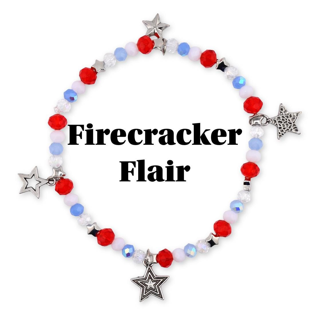 A beaded bracelet with red, white, and blue beads and silver star charms. The bracelet has the text "Firecracker Flair" in black letters.