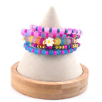 Flower Child Beaded Bracelet Stack: Colorful Glass Rondelle Daisy Beads