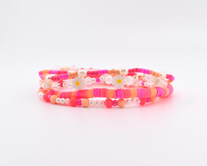 Sorbet Groove Bracelet Collection: Pink and Orange Beaded Bracelets with Daisy Accents