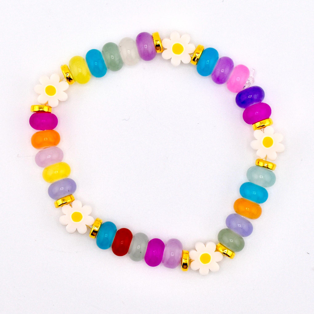 A colorful beaded bracelet featuring a variety of vibrant, oval-shaped beads in shades of blue, green, yellow, purple, pink, and orange. White daisy-shaped beads and gold-colored spacers add detail to this playful accessory.
