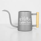 A gray metal watering can with a long, thin spout and a light-colored wooden handle. The side features a white line-art graphic of five potted plants above the white text "Custom Text" and "OPTIONAL LINE 2" in a script font.