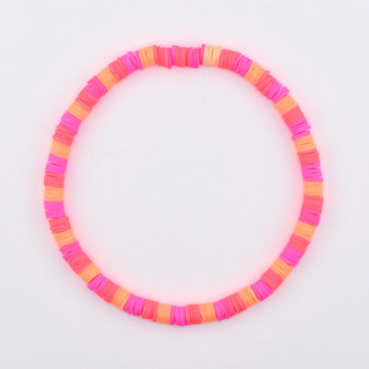 Sorbet Groove Bracelet Collection: Pink and Orange Beaded Bracelets with Daisy Accents