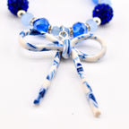 Blue Crystal Beaded Bracelet with Marbled Bow Charm | Handmade Tumbler Accessory