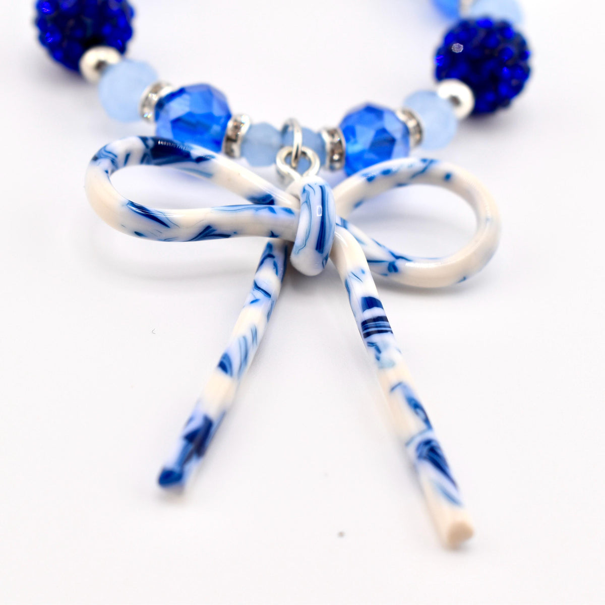 Blue Crystal Beaded Bracelet with Marbled Bow Charm | Handmade Tumbler Accessory