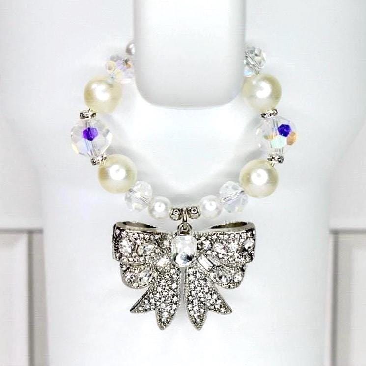 Pearl Elegance Bow Tumbler Handle Charm Bracelet