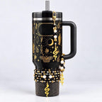 Black and Gold Snake or Moth Straw Charm