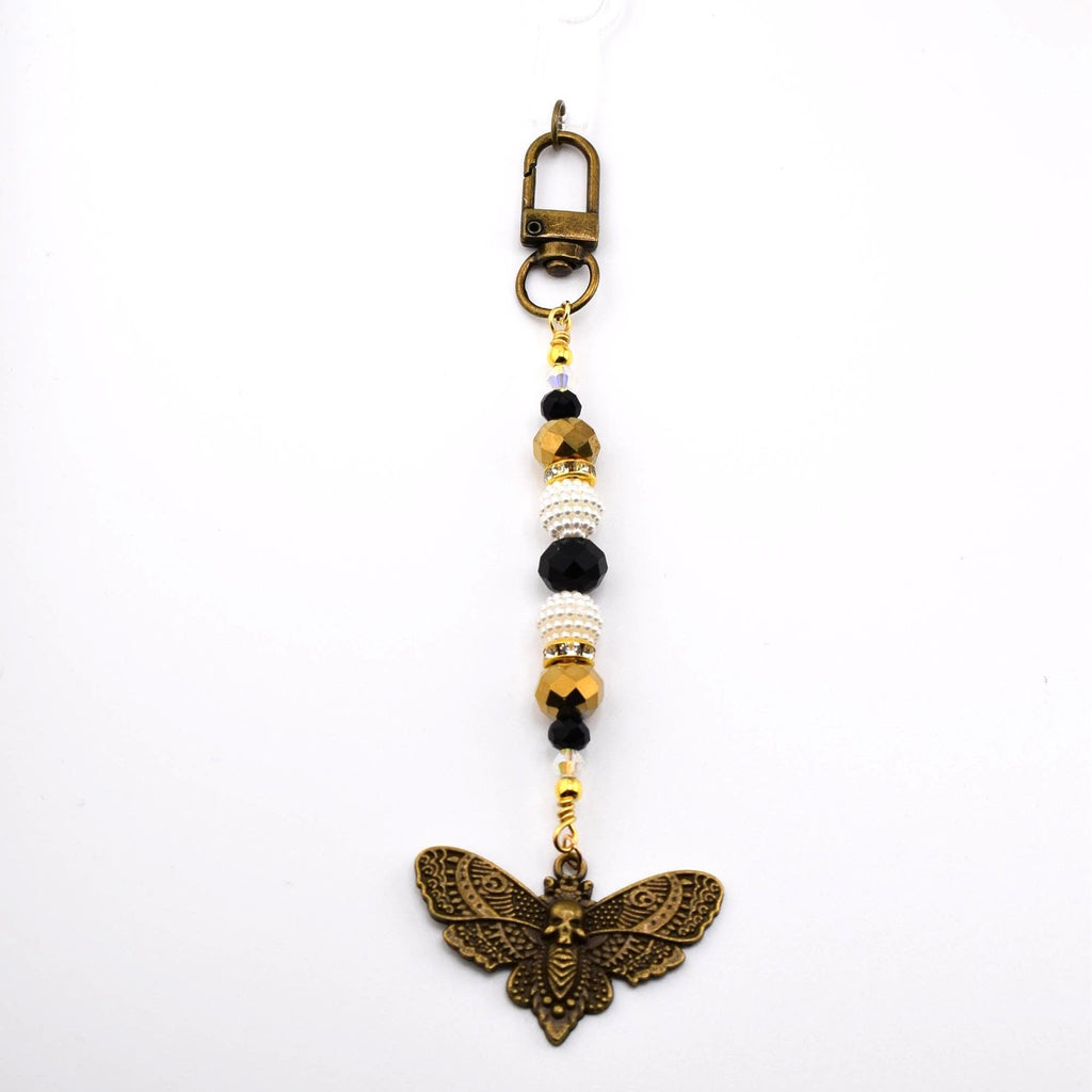 Black and Gold Snake or Moth Straw Charm