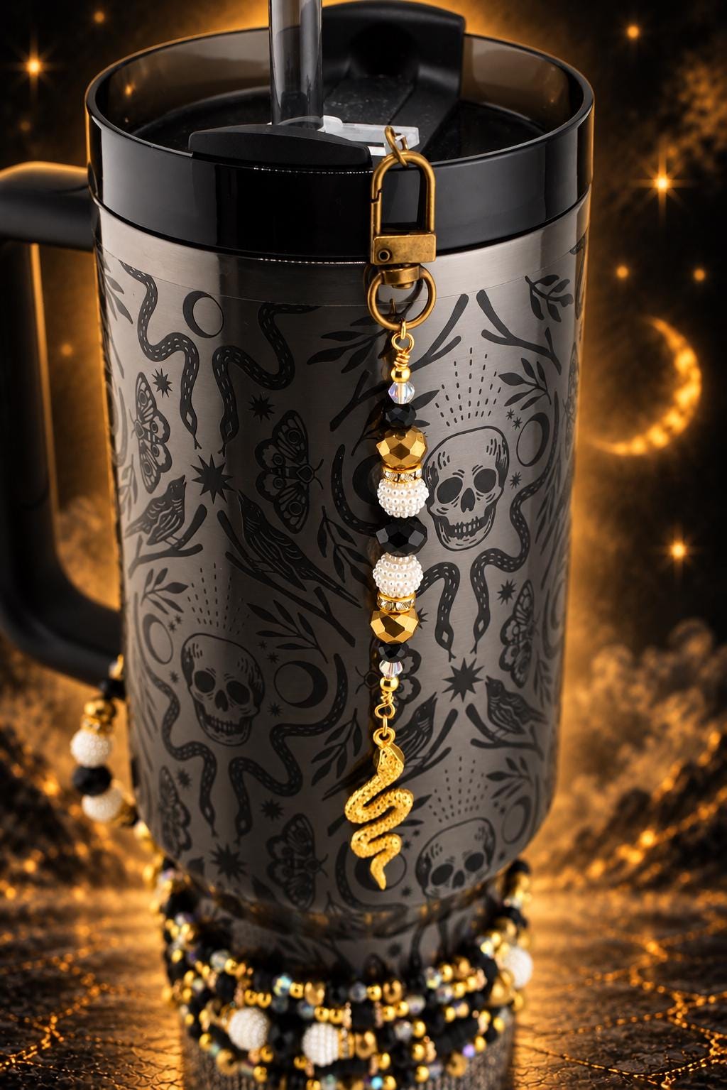 Black and Gold Snake or Moth Straw Charm