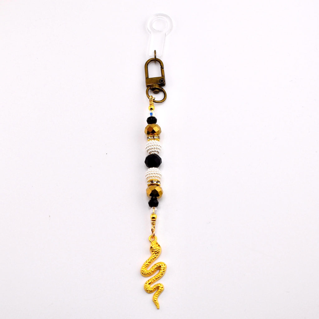Black and Gold Snake or Moth Straw Charm