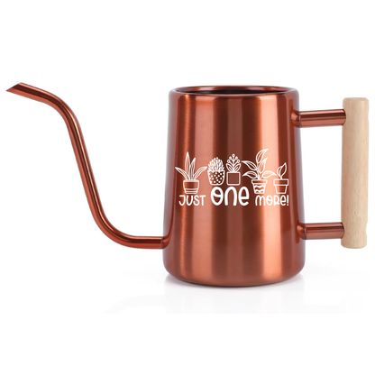 Copper-colored watering can with wooden handle and plant-themed text on a white background